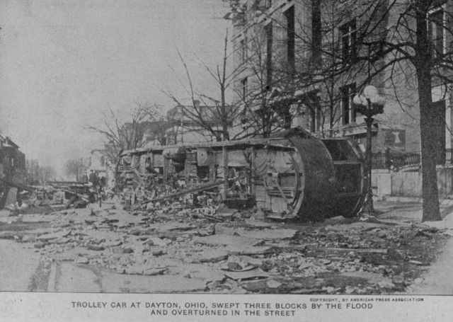 A trolley car at Dayton swept three blocks by the flood and overturned. Picture