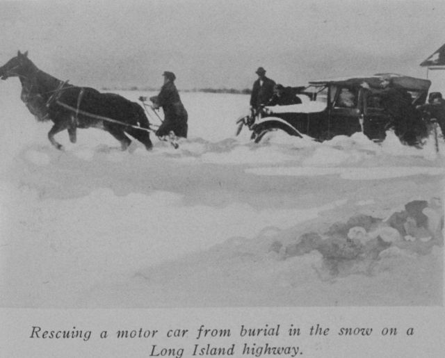 Rescuing a motor car from burial in the snow on a Long Island Highway Picture