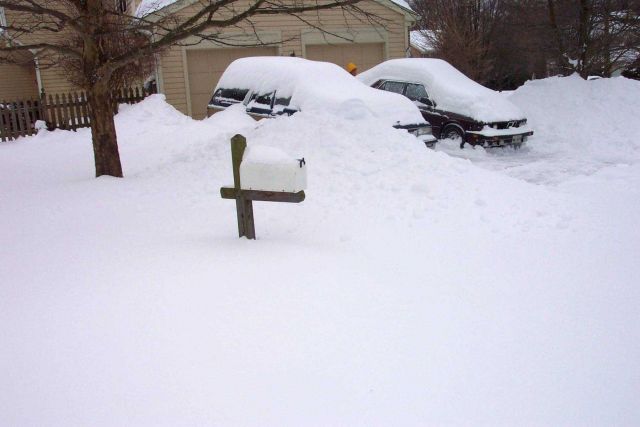 Digging out the driveway with still no place to go following a heavy snow. Picture