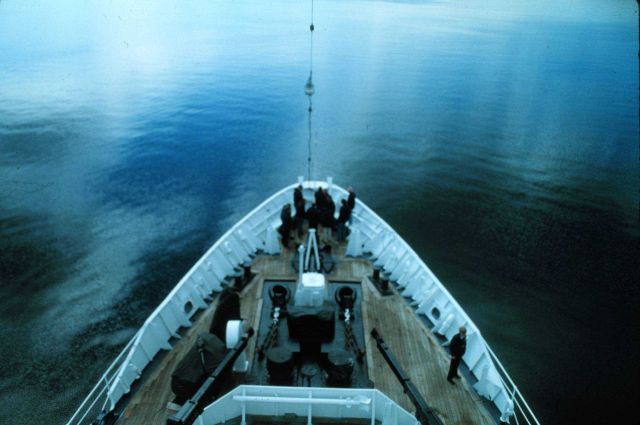 Cloud reflections on a calm sea Picture