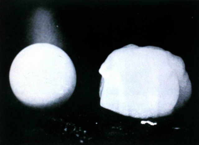 Comparison of a tennis ball on the left with a large hailstone. Picture
