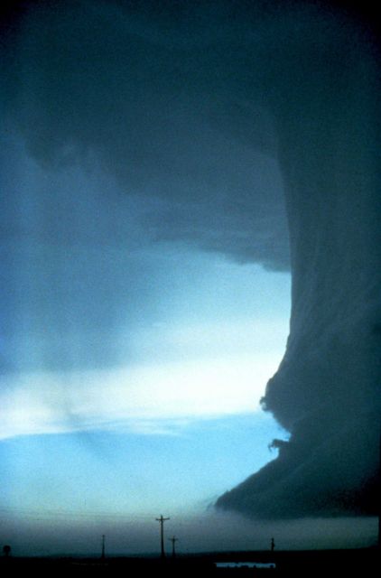 Limb of microburst apparent to left of vertical cloud column. Picture