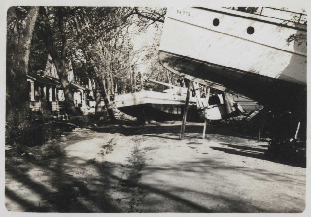 Boats strewn amongst homes in Pawtucket Cove Picture