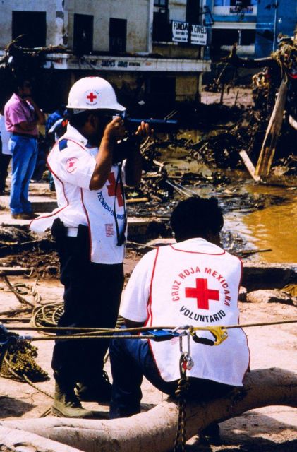 Red Cross worker documenting the damage caused by Hurricane Mitch Picture