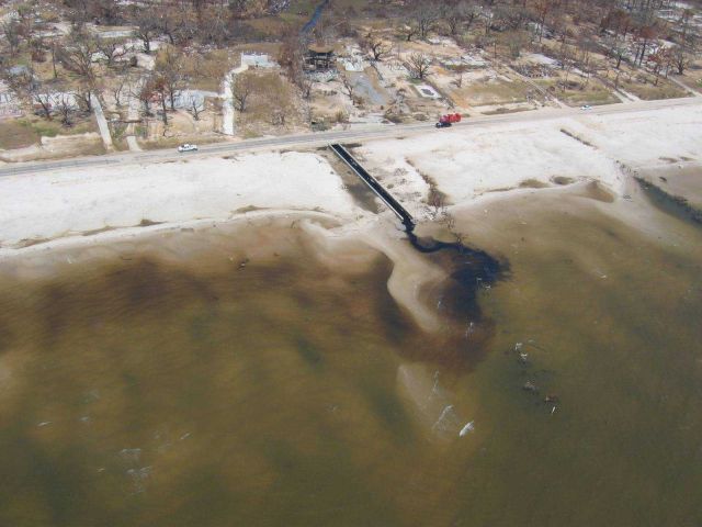 Destroyed homes and ecological damage along Waveland beachfront. Picture