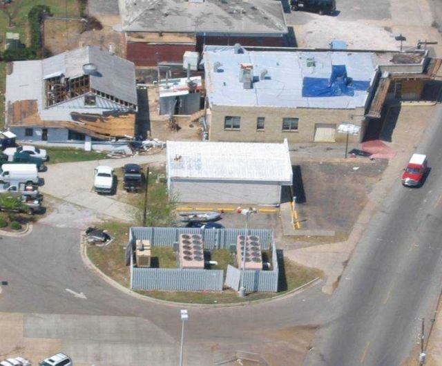 Damage in the vicinity of Economy Drug Store in downtown Biloxi. Picture