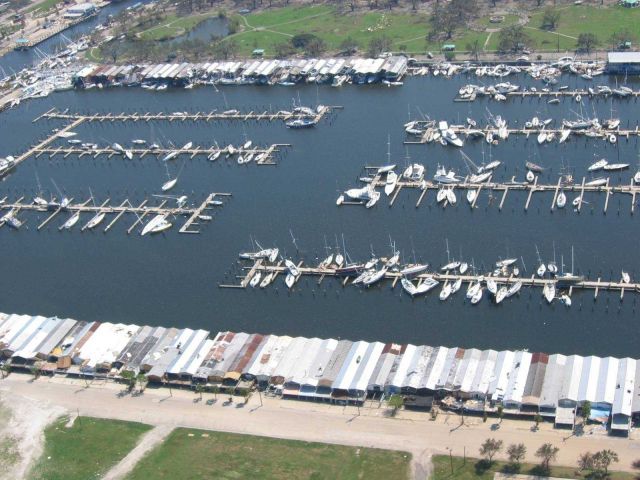 Boats tossed around like kindling at a marina. Picture