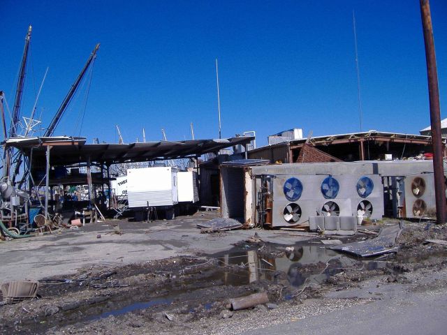 Image -1 showing devastation caused to infrastructure by Katrina (right image). Picture