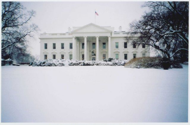 The White House draped in newly fallen snow. Picture