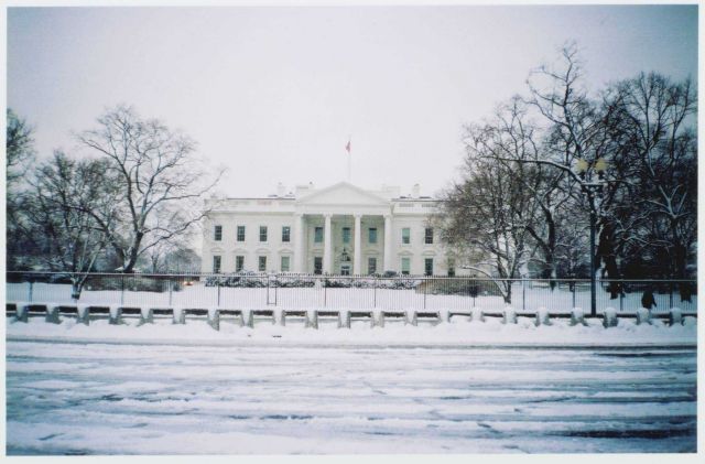 The White House draped in newly fallen snow. Picture