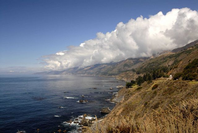 Orographic lift of moist air coming off ocean produces clouds along the Santa Lucia Mountains south of Monterey. Picture