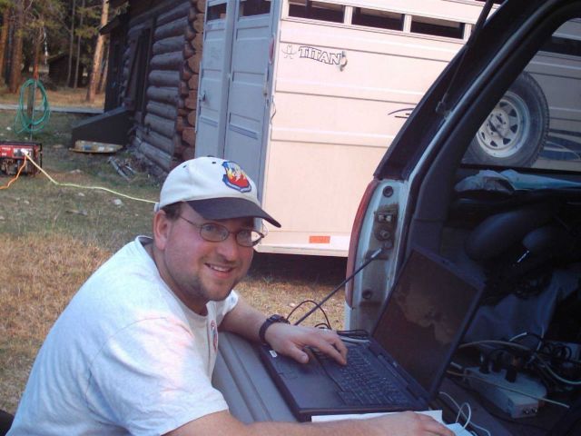 NOAA Employee Dan Borsum takes his own picture while writing a forecast for the Sun River Prescribed Burn Picture