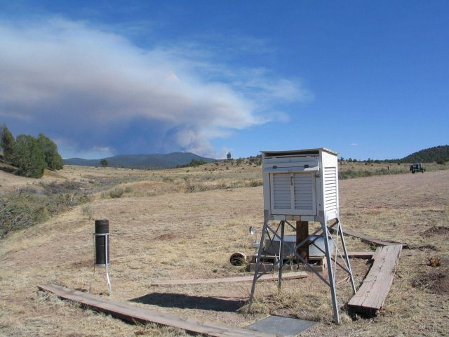 A cooperative observer's cotton region shelter, precipitation gauge, evaporation pan, and etc Picture