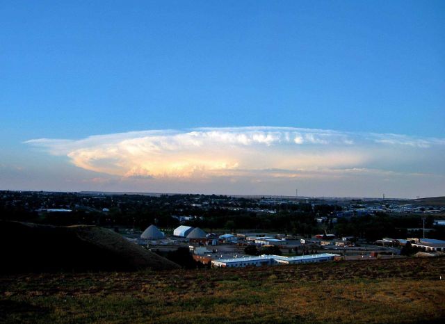 A massive supercell which dropped large hail is visible out the window of the Rapid City National Weather Service Office. Picture
