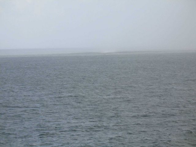 Waterspout sequence as the spray from a waterspout approaches the NOAA Ship GORDON GUNTER which is constrained in its ability to maneuver as the recen Picture
