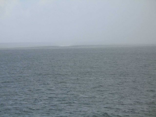 Waterspout sequence as the spray from a waterspout approaches the NOAA Ship GORDON GUNTER which is constrained in its ability to maneuver as the recen Picture