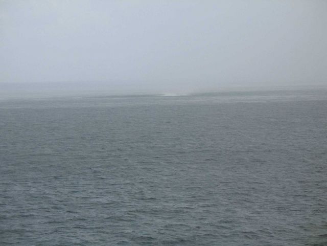 Waterspout sequence as the spray from a waterspout approaches the NOAA Ship GORDON GUNTER which is constrained in its ability to maneuver as the recen Picture