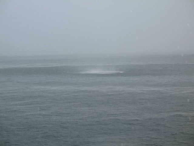 Waterspout sequence as the spray from a waterspout approaches the NOAA Ship GORDON GUNTER which is constrained in its ability to maneuver as the recen Picture