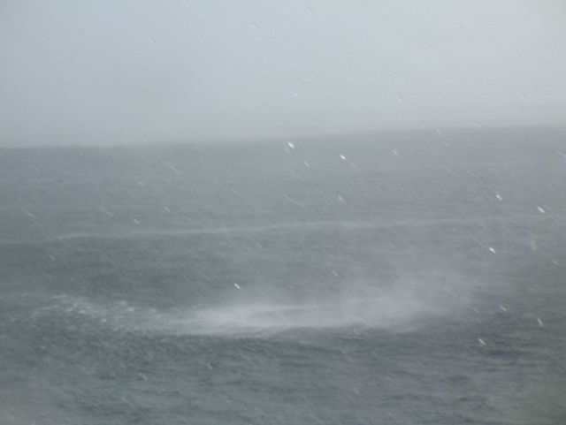 Waterspout sequence as the spray from a waterspout approaches the NOAA Ship GORDON GUNTER which is constrained in its ability to maneuver as the recen Picture