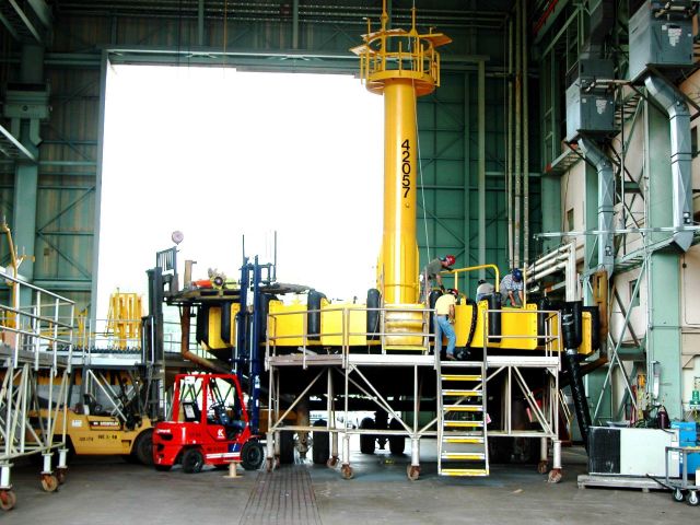 Field Technicians preparing 10-Meter Buoy for deployment. Picture