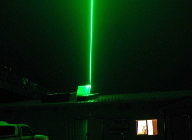 The brilliant green beam of the lidar at the Mauna Loa Observatory (MLO) pierces up to the stratosphere to measure aerosols and water vapor Picture