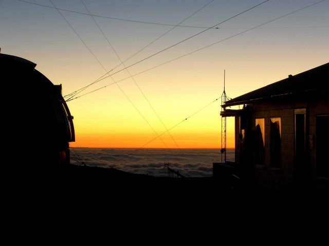 A brilliant twilight glow signals the ending of another day of measurements at Mauna Loa Observatory Picture