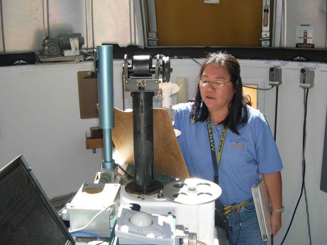 The late Leslie Pajo measures the ozone layer from inside the Dobson spectrophotometer dome at the Mauna Loa Observatory. Picture