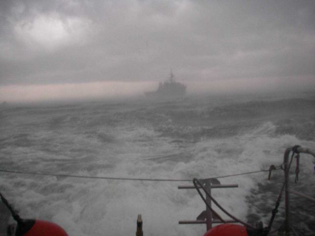 NOAA Ship THOMAS JEFFERSON seen from survey launch at the tail end of a squall Picture