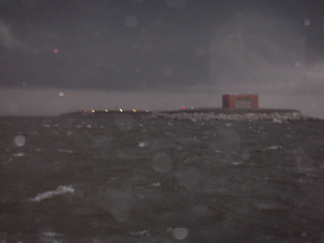 View of the north end of the Chesapeake Bay Bridge Tunnel from survey launch 3102 while in the midst of a thunderstorm. Picture