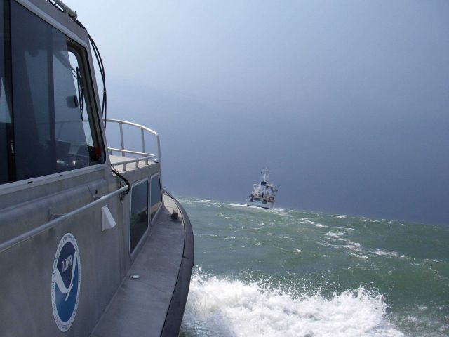 Launch 3102 following NOAA Ship THOMAS JEFFERSON into safer waters as a heavy thunderstorm bears down. Picture