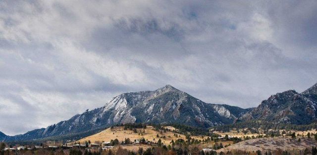 Flatirons west of Boulder covered with light dusting of snow. Picture