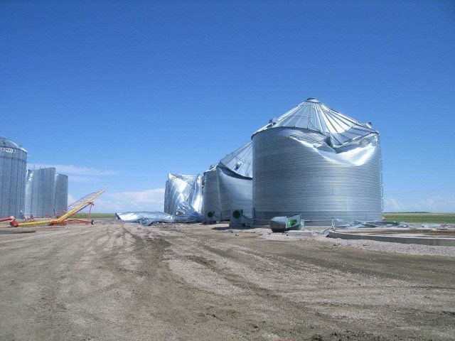 Grain bins damaged/destroyed 6 miles west of Agar. Picture