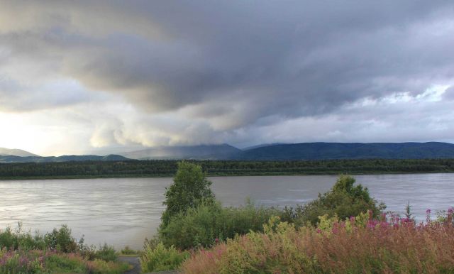 Squally weather near midnight on the Yukon River. Picture