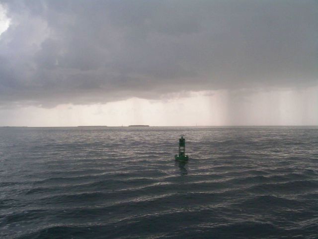 Rain squalls in the area as the NOAA Ship PISCES departs Key West. Picture