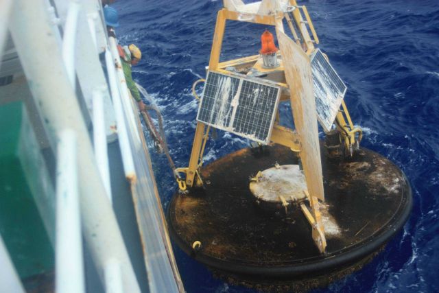 Recovering an adrift 3-meter weather buoy off the NOAA Ship Ka'imimoana Picture