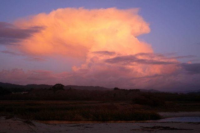 A thunderstorm seen from the mouth of Carmel River looking SE over the coast range of mountains. Picture