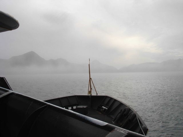 Haze and fog obscure the Alaska Peninsula as seen from the MILLER FREEMAN. Picture