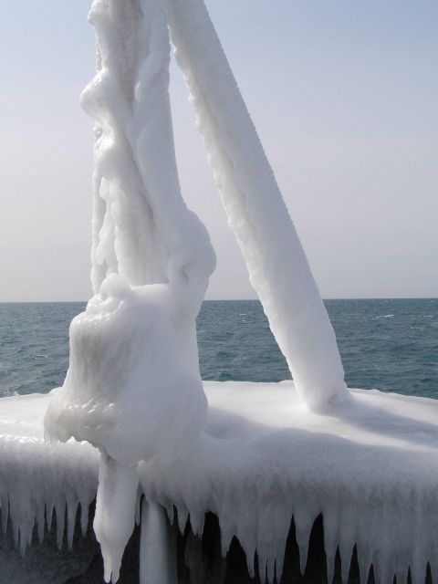 Heavy ice enshrouding the MILLER FREEMAN ship's bell. Picture