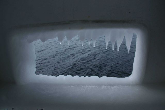 Icicles adorn this hawse hole on the NOAA Ship MILLER FREEMAN after encountering icing conditions. Picture