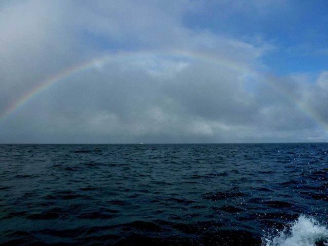 Rainbow seen at sea seen in vicinity of Kotzebue. Picture