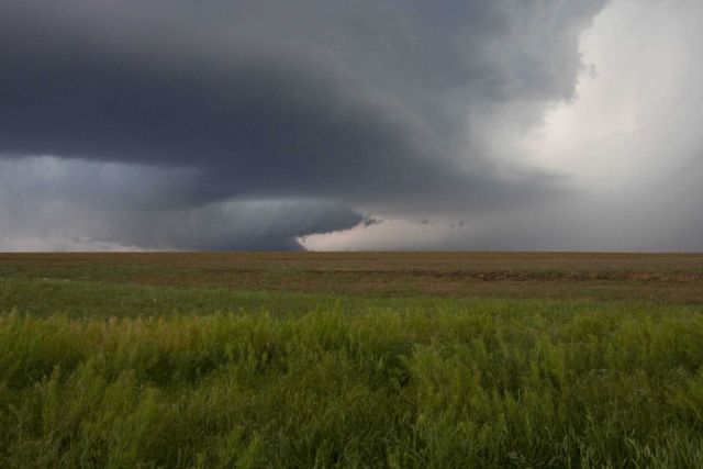 Intense updrafts produce a rain-free cloud base in a supercell thunderstorm. Picture