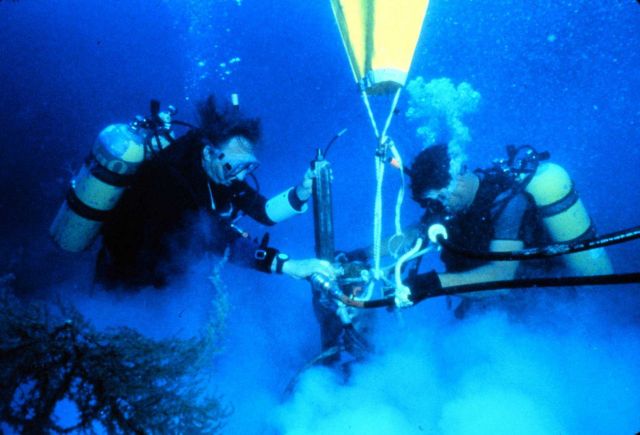 Divers collect shallow sediment cores to track coastal erosion processes. Picture