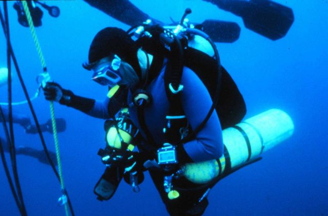 Technical diver, using mixed gases to dive to 60 meters, decompresses. Picture