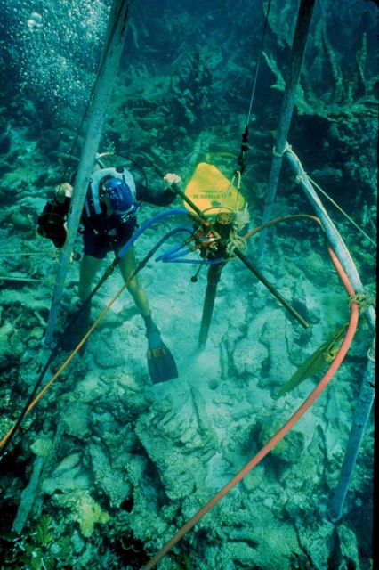 Coring into a coral reef to discover clues to past climate changes. Picture