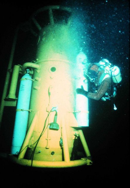 Dive bell equipped with compressed air allows divers to decompress underwater. Picture