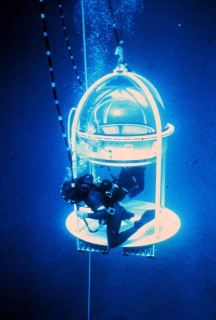 Clear dome in this bell allows scientists to record observations in midwater. Picture