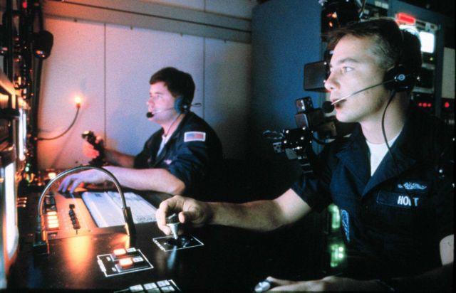 Conning station includes joysticks to operate ROVs and cameras. Picture
