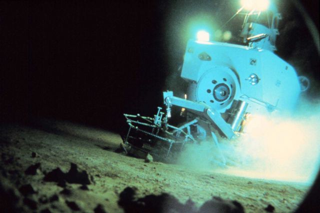 DSV Alvin sets a lander basket with tube cores on the bottom. Picture