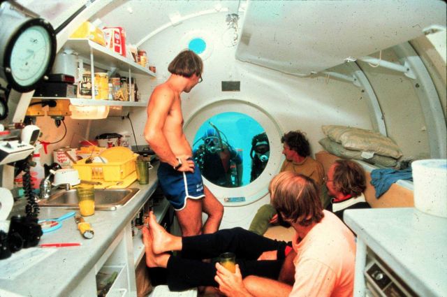 Aquanauts relax inside HYDROLAB; held 4 but only 3 could sleep at one time. Picture