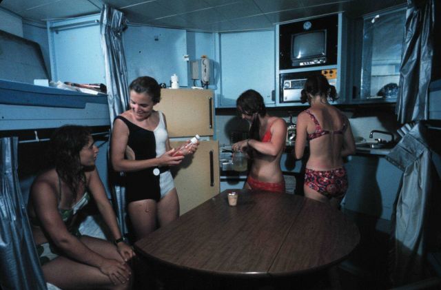 TEKTITE II all female team in crews quarters, including Sylvia Earle (b&w suit). Picture